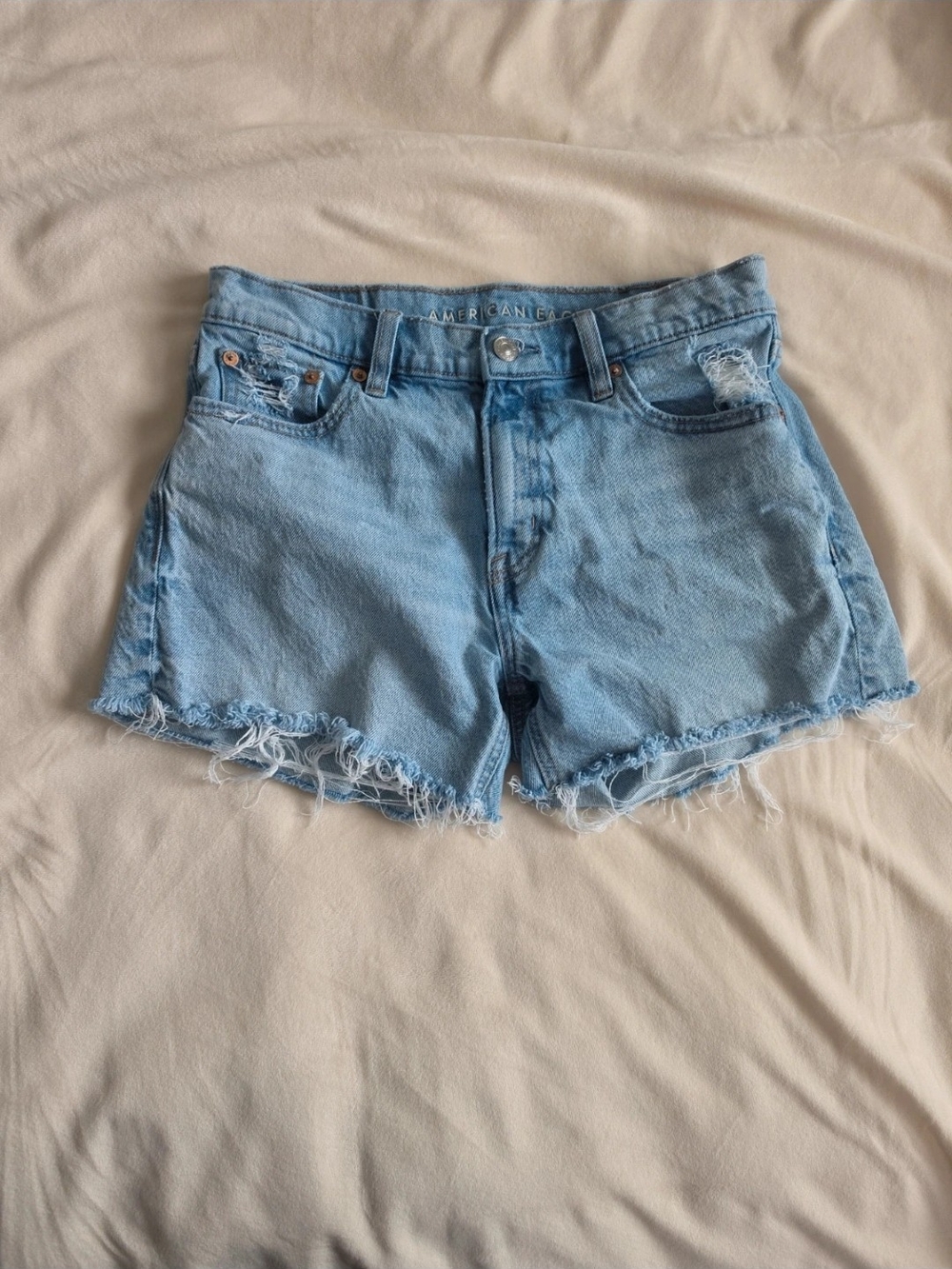 American Eagle Outfitters Light Wash Frayed Hem Denim Shorts
